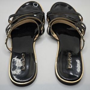 Size 7 Bebe Black & Gold Sandals